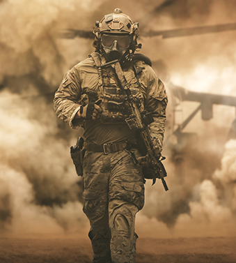 Soldier in tactical gear, smoke backdrop